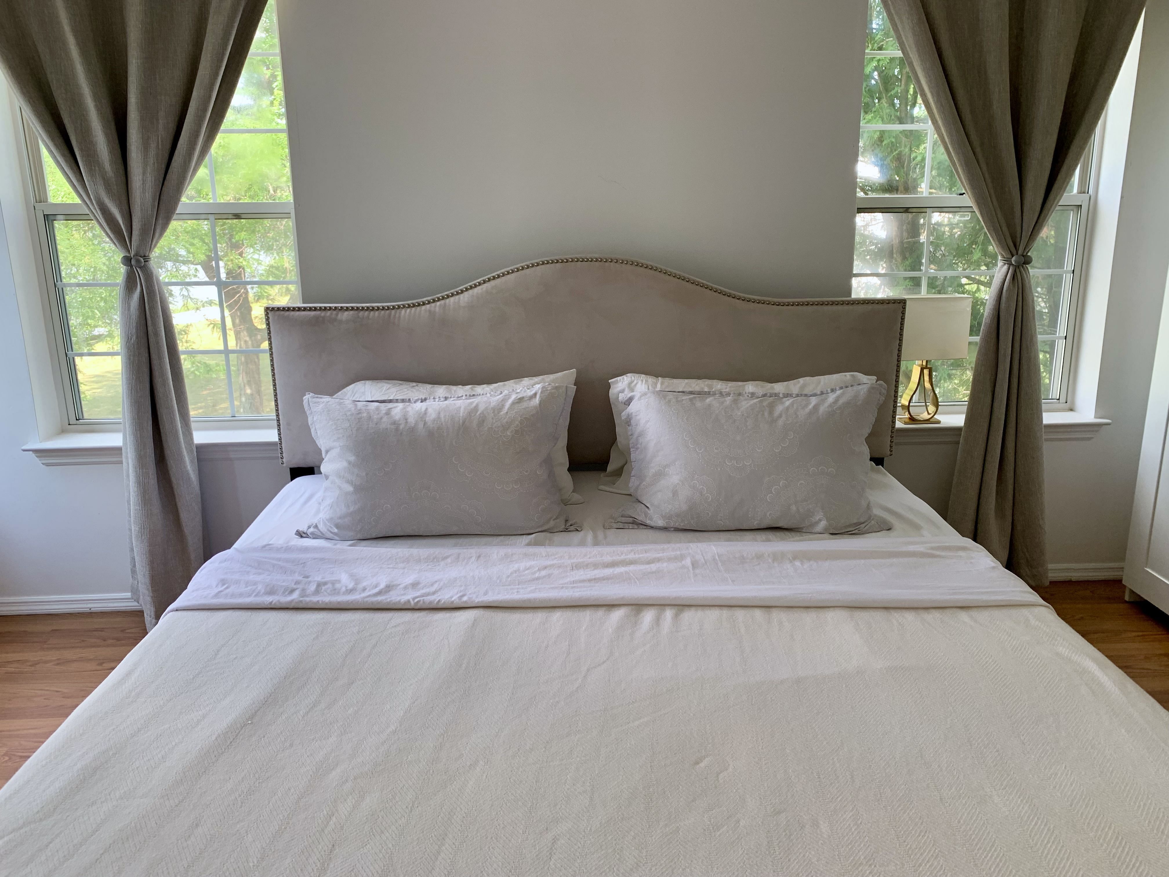 JWguest Condominium at Middletown, New York | Serene master bedroom with a lakeview | Jwbnb no brobnb 1